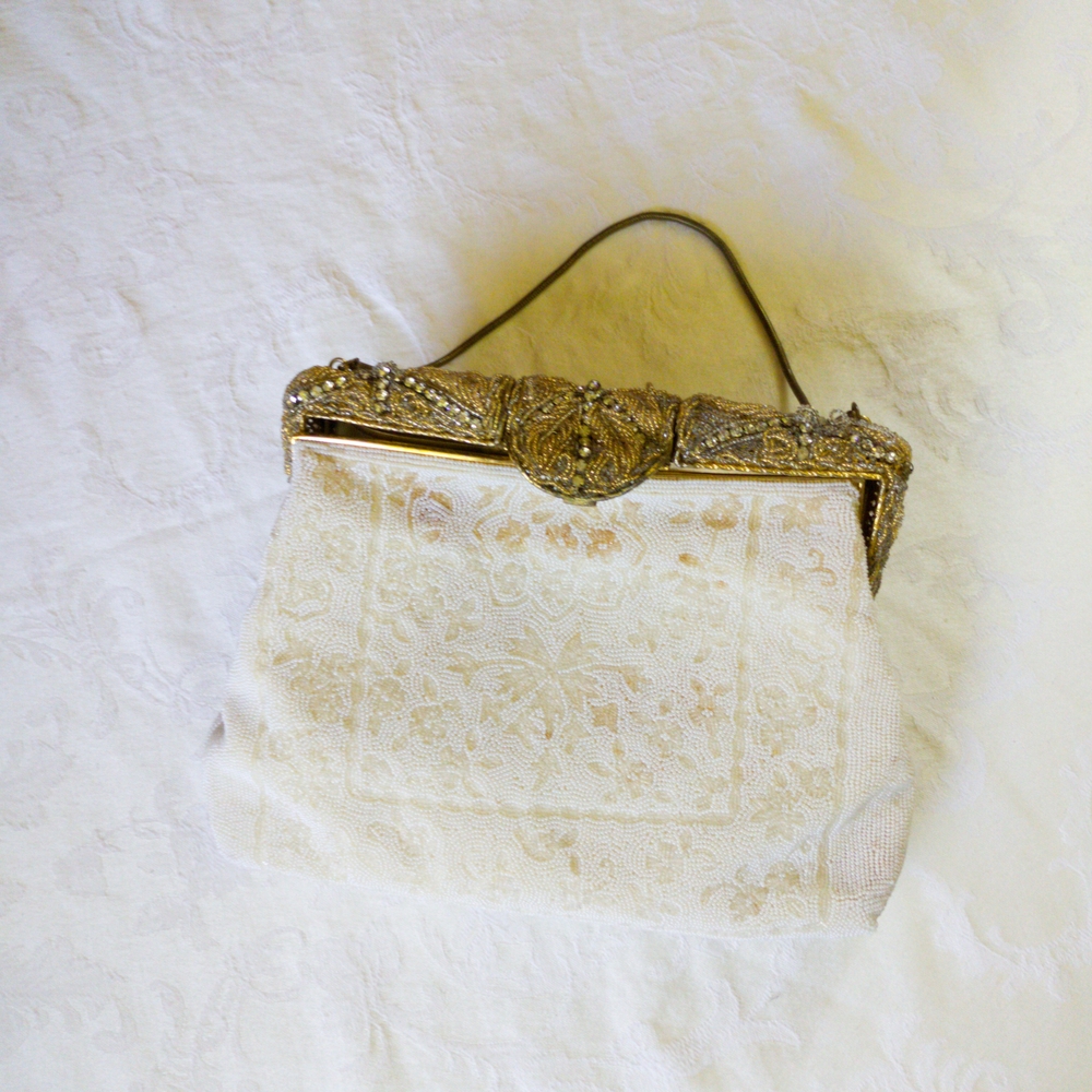 Elegant Gold and Cream Clutch